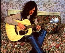 Jimmy Page on acoustic guitar